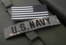 U.S. Navy patch with black-and-white American flag.