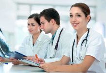 Doctor’s Heartfelt Move: From Surgery to Adoption Three medical professionals reviewing patient x-rays in a healthcare setting