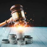 Exit TAX Shock: Blue States Clamp Down Gavel, coins, and tax icons on a table.