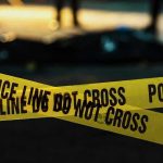 DERANGED Killer Mistakes Innocent Worker for Demon Police tape marking a crime scene at night.