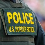 Freshman MURDERED—Biden Border Policy Blamed Police U.S. Border Patrol uniform close-up.