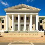 Haitian Migrant MURDERS Florida Mom Exterior view of the Supreme Court of Florida with columns and palm trees