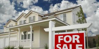 Housing Crisis CRUSHED — FLOATING Home Hack A suburban house with a For Sale sign in the front yard
