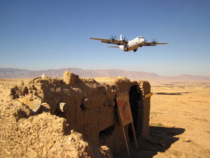 shutterstock_45689446.jpg Military aircraft flying over a desert with an abandoned bunker and a for sale sign