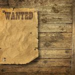 Cat VANISHES During Tragedy—Then THIS Happens A vintage wanted poster pinned to a wooden wall