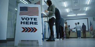 From MAGA Loyalist to 25th Amendment Advocate Sign reading Vote Here in a polling station.
