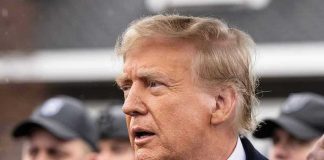 Trump Renews Push to Wipe Impeachments From Books Man in suit and red tie speaking outside.