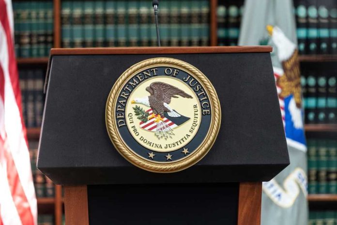 shutterstock_2153473169 Podium with the Department of Justice seal and American flag in the background
