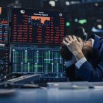 What The June Inflation Drop Really Shows Trader stressed out by multiple declining stock charts.