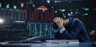 What The June Inflation Drop Really Shows Trader stressed out by multiple declining stock charts.