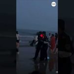 Drone Orders Man Out of the Ocean at Night in China | "Big ...
