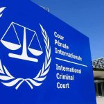 Why the ICC Fired Its Top Prosecutor International Criminal Court sign with scales emblem outside modern building