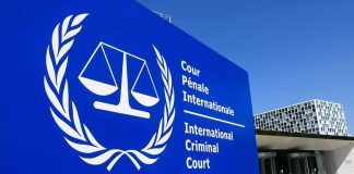 Why the ICC Fired Its Top Prosecutor International Criminal Court sign with scales emblem outside modern building