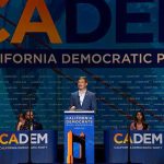 Speaker at podium during California Democratic Party event