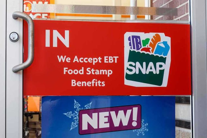 shutterstock_1505479568 store door sign indicating EBT SNAP acceptance