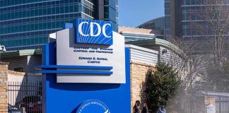 CIA Bombshell: COVID Origin Buried CDC campus entrance sign with modern buildings in background