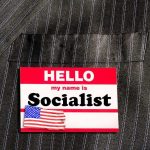 Name tag on a pinstripe suit jacket pocket