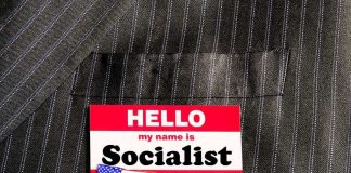 Name tag on a pinstripe suit jacket pocket