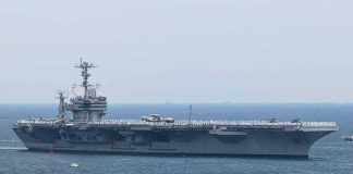 Aircraft carrier sailing at sea