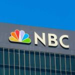 NBC logo on a modern office building facade