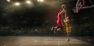 Fans Ejected Over Three Words At WNBA Game Two basketball players contest a layup under the hoop