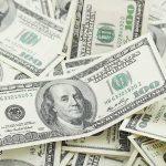 Stack of U.S. hundred dollar bills