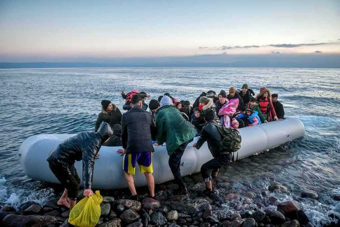 People arriving in a crowded inflatable boat at a rocky shore