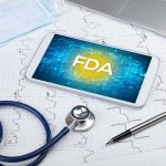 GOP Senator Gets Torched Over Trump’s FDA Pick Tablet with FDA on screen amid medical tools and ECG charts