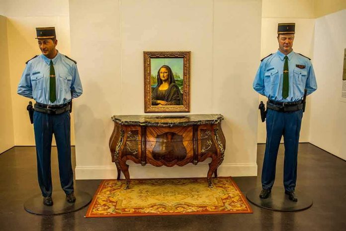 Two uniformed guards flanking a framed portrait on a wall