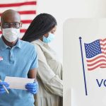 One Texas Poll Just Triggered A Media Frenzy Voters wearing masks at a polling station