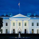 Rogue Leakers Steer U.S. War Moves White House illuminated at dusk with flagpole and columns