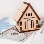 CEO Calls Out Ro Khanna’s ‘Glaring Hypocrisy’ Wooden house model on money and contract papers
