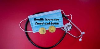 Stethoscope and face mask with coins on red background