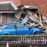 Tesla Autopilot Horror Inside A Home Blue car crashed into brick house wall