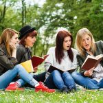 How China Is Using AI to SPY On Its Enemies Group of young women reading books on grass in a park