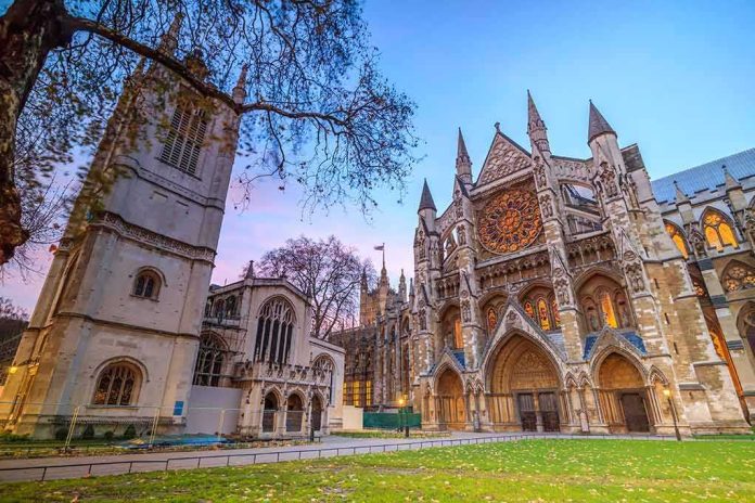 Gothic cathedral facade at dusk with illuminated rose window