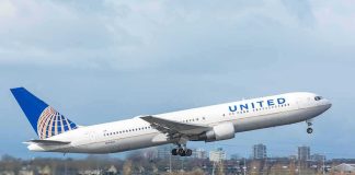 United Airlines jet taking off from runway
