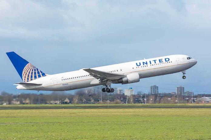 United Airlines jet taking off from runway