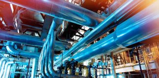 Industrial plant with large metal pipes and gauges