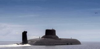 Navy Sub Earned 15 Major Military Honors in the Shadows Submarine cruising on calm sea