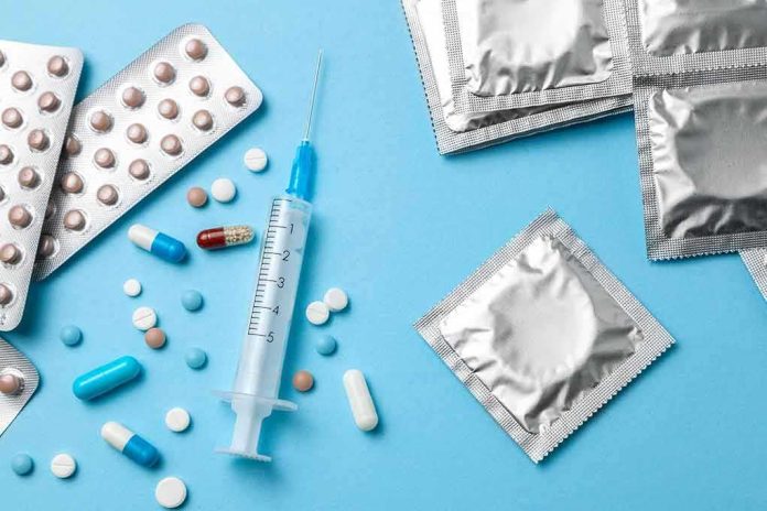 Contraceptives and medications on blue background
