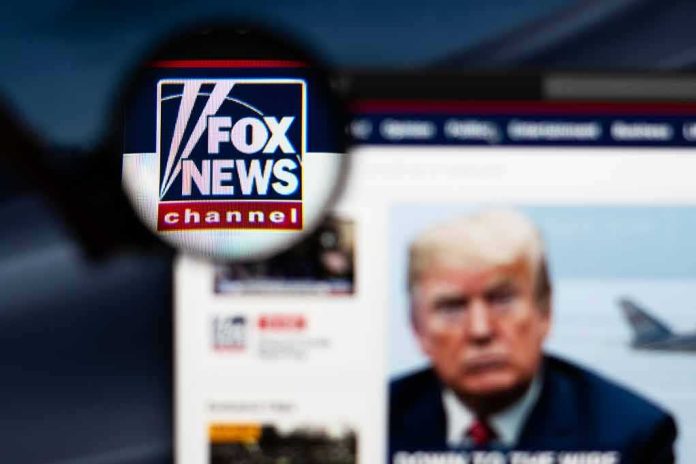 shutterstock_1288386304 magnified fox news logo over blurred website