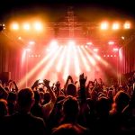 concert crowd under bright stage lights