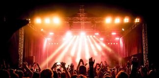 Children SHOT at College Homecoming concert crowd under bright stage lights