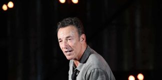 Bruce Springsteen performing on stage